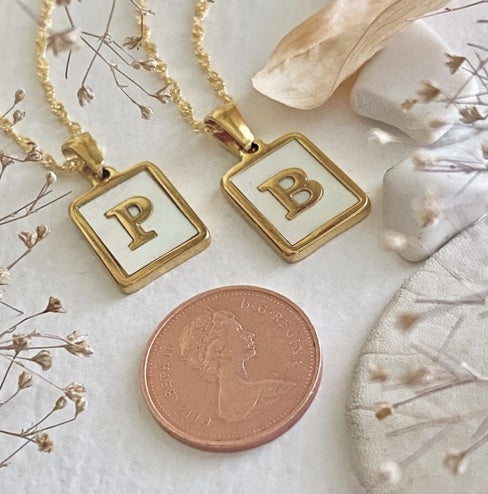 CARRIE MOTHER OF PEARL INITIAL CHARM NECKLACE -gold